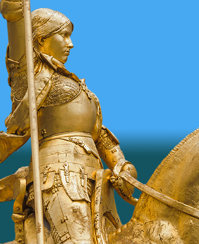 closeup of gold statue of Joan of Arc