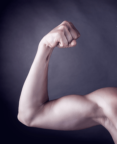 woman's muscular biceps flexed